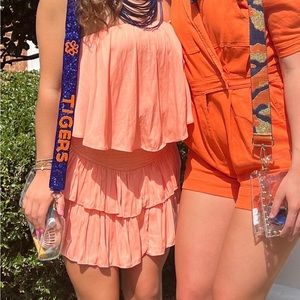 small orange boutique romper